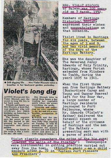 A newspaper cutting with a picture of 99 year old Mrs Violet Hiscock in her garden in Balwyn, with a brief text underneath, and a brief biography of Mrs Hiscock typed beside it. 