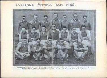 This image shows a football team posing for a photograph.  There are seven men standing in the back row, seven men sitting in the middle row and five men sitting on the ground in the front row.  All are wearing long socks, white shorts and shirts with either long sleeves or sleeveless.  Printed at the top on the mounting is: “Hastings Football Team. 1930 and printed on the mounting at the bottom is: Hastings Team:-Back row, left to right: L. Mentiplay, G. Perrott, G. Mirabella, E. Fisher, J. Wilson, W. Patience (19th man), S. McLear. Centre: R. Aust, S. Mirabella, E. Lovett, C. Splatt, J. Mirabella, W. Armstrong, F. Smith.  Front: H. Jack, R. Mentiplay, H. Hodgins, C. Perrott, H. Porter.”