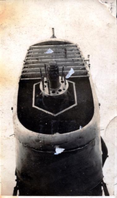 This image shows a close-up of the front of an early aeroplane. 
