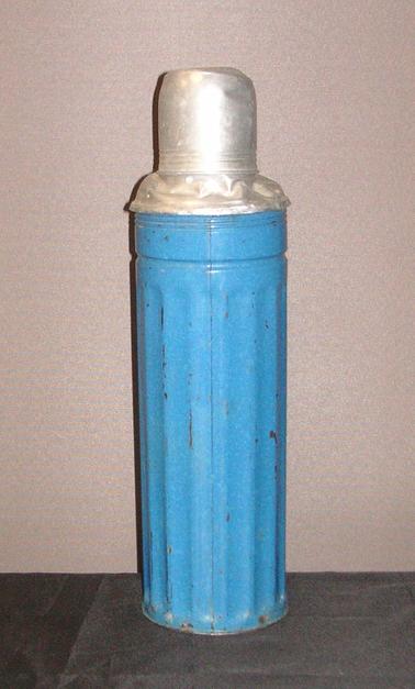Blue painted thermos flask with cork and aluminium lid.