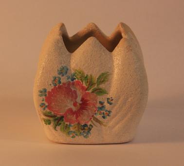 Small pottery vase - square “bud” shaped.  Rough cream outside, yellow inside.  Hand painted floral pattern on 2 sides.