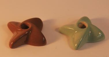 Two pottery tap handles.  Item 9.1 has green-blue glaze.  Item 9.2 has brown glaze.  