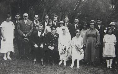 Newman family wedding. Groom: William Pilbeam, Bride: Minnie Newman, Groom in naval uniform.  Guests: Irene Newman, Ted Newman, Charles Newman, Joe Newman, Frank Newman, Chirs(?) + wife Sadie, Elizabeth Newman, Louise and Mary Lucas, Louisa Newman, Marie Newman, Harold Pilbeam,  Dora Newman