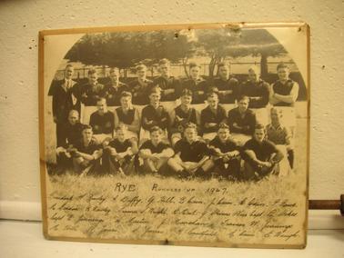 Rye Football Team 1947 (established in 1946).  Group photo of 23 men in the Rye Football Club uniform at Rye football ground.  Includes President and trainers. 