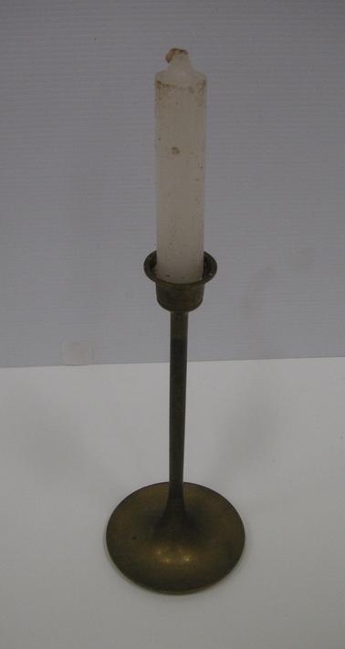 Rounded base, narrow stem, fluted top.