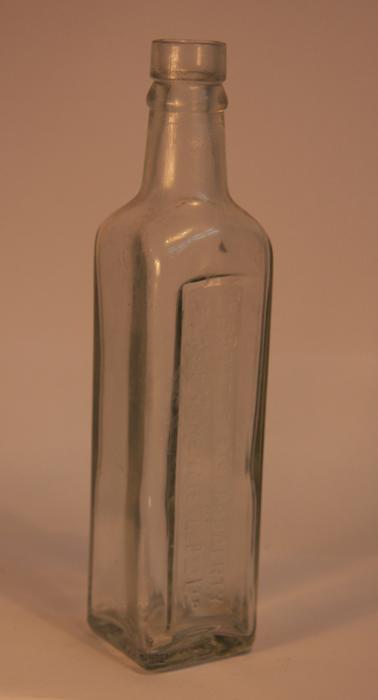 Square glass bottle probably for sauce.