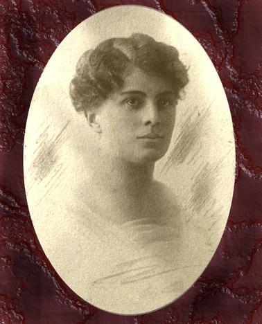 Portrait of Annie Rowley (nee Cain) as a young woman.  1915. The photographic image is on canvas