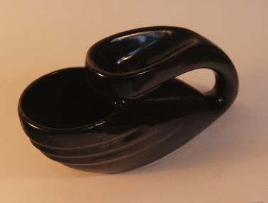 Pottery shaving mug with black glaze.  