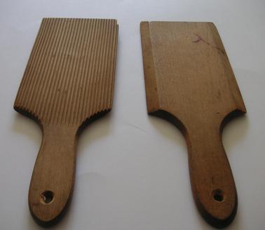 2 Wooden butter pats, grooved on one side, rectangular, bevelled edges, with handle.