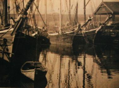 Sepia print of ketches used by Ben Stenniken to transport lime and tea tree from Rye to Melbourne and return with supplies. Approx. 1900