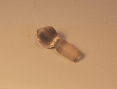 Clear glass bottle stopper with 6 sided top