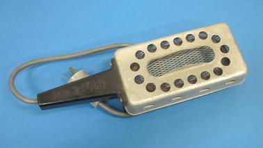 Rectangular Aluminium Holder with Bakelite handle and feet.  Coil inside, mesh underneath.  Attached to electrical cord and 3 pin plug.