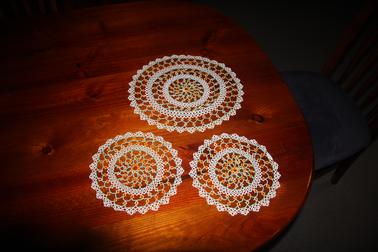 Set of 3 round crocheted green, yellow and white doyleys. 