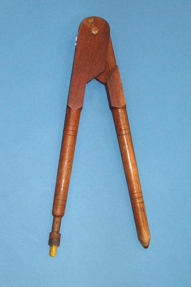 Large wooden compass, with metal chalk holder and metal butterfly screw at the top.  For blackboard use.