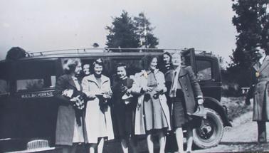 Rye Girls Club being picked up by Ed Johnson of Sorrento in his Packard to go to the snow at Yarra Junction for the weekend. The names have been written on the back of the photo