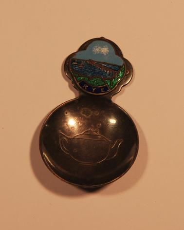 Tea caddy spoon with badge - enamel - showing pier at Rye Vic. with shed at end etching of teapot on scoop.
