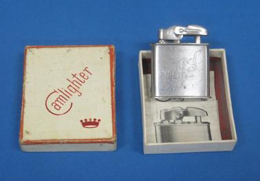 Chrome cigarette lighter (Camlighter)with initials AJ.S. engraved on front  in cardboard box.