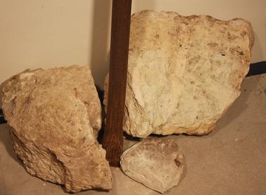 Crow bar made of steel with point at one end and spade at other end.  Used for breaking up lime.