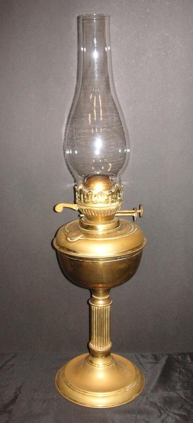 Brass Lantern with glass flue with double wick.  Lead for stability.