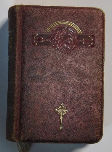 Brown leather bound book with green coloured tape book marker attached.  Inside price 9/6 with inscription “ To dear Mother with Best Wishes for Her Birthday 11-10-31.  Love from Jessie & Lizzie.  (Added later “Daughters - Lizzie and Jessie Hazledine”). 