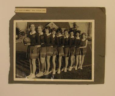 Photo of Rye Netball Team 1958 in uniform.  Inscription reads “SnapsTaken on Monday, 27thJanuary 1958