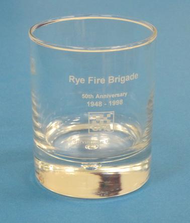 Glass tumbler with CFA logo  and printing : “Rye Fire Brigade 50th Anniversary 1948-1998 - Serving the Community”  in white printing