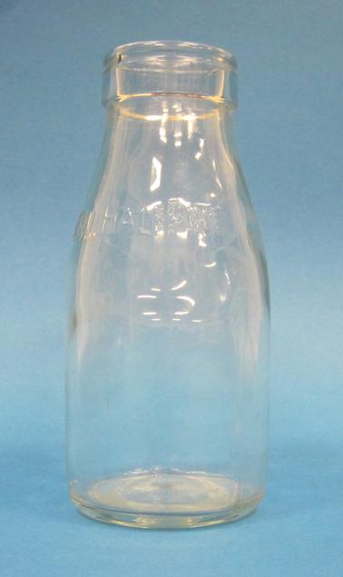 Glass milk bottle “Imperial half pint” stamped on glass.  “176” stamped on base of bottle.  Would have been sealed on top with aluminium cap.
