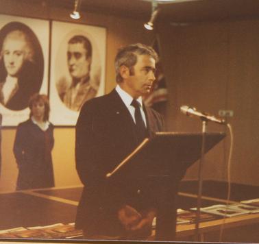 Pat Sansonetti of Rye, (formerly of Italy) at his Naturalisation on 10 October 1983.  Two persons at rear of photograph unknown.