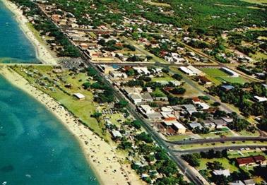 Postcard.  Rye from the air.  Shows beach before boat ramp and trailer car park.   