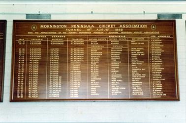This image is a photograph of the Mornington Peninsula Cricket Association honour board.  There are eight columns showing the Year, Office Bearers, Premiers and Life Members.  
