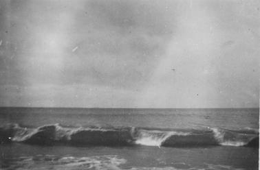 Wave breaking at Merricks Beach.