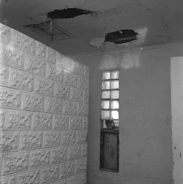 Indoor view of a public swimming pool facility.