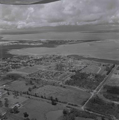 Aerial photograph of a coastal town.