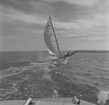 A man leaning out to balance his yacht as he sails on Westernport Bay.