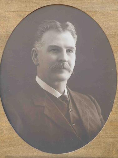 Portrait of a man and inscription on reverse of the frame and a JPG copy.