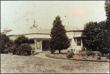 This image of ‘Ramslade’ c1894 is of a side view showing a sweeping pathway leading to the house, a double fronted, gabled and verandahed wing, with cast iron detail to verandah, hipped roof, established gardens