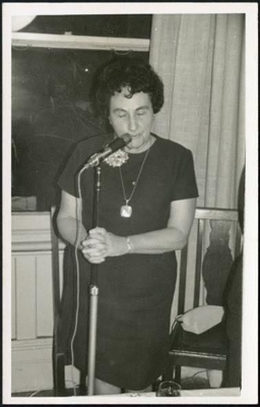 Mrs Leslie Moorhead speaking at the microphone at the launch of the Westernport Book Sale at Ballam
Park in 1970