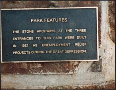 A close up view of the bronze plaque which is situated on the stone gateway of the Mornington Park the inscription explains that this gateway was constructed during the Depression by Unemployment Relief Workers 