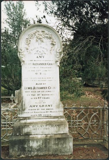A front view of the grave of Alexander Grant, Lewis Alexander Grant, Amy Grant,
the inscription is laid on white marble with the base of the grave being of stone or cement