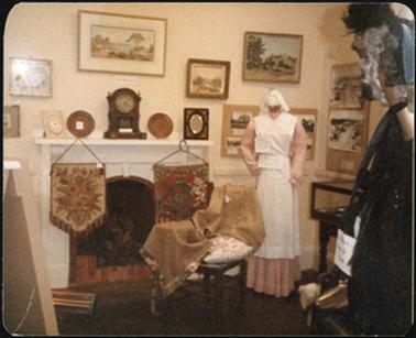 Clothing and other items displayed on and around the fireplace OPOM Mornington