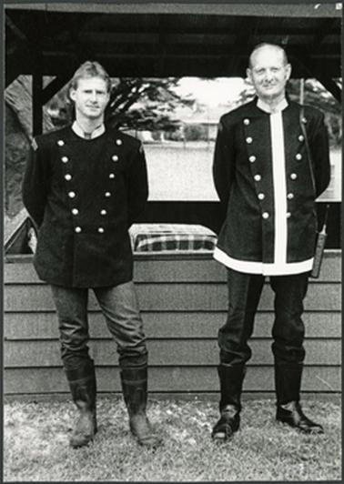 Two Mt Eliza Firemen in old-style uniform at the Picnic in the Mornington Park
