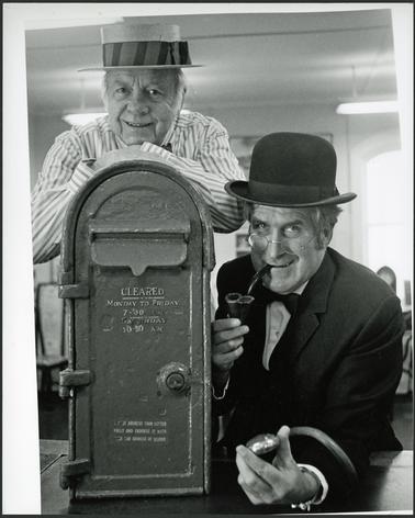 This image is of Clarrie Rawlings, Asst Secretary and Neil Taylor President, OPOM Mornington, August 1989,
photographed in period costumes near the old letter box