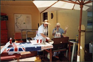 Diane White and Margaret Grice looking after the sausage sizzle in front of the OPOM on Australia Day 2002
