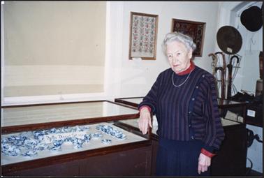 Mornington Historical Society Member, Stella Wade, photographed with one of her displays