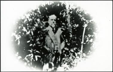 A photo of Charles Bennett in his garden at Mornington