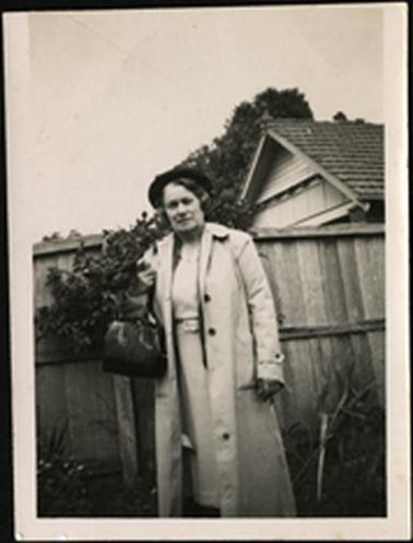 Wyn Bradford photographed in a garden