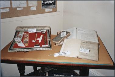 This photo shows various historical items displayed this being whalebone, book marks and books for Heritage Week 1988 at the Mornington Historical Society Museum