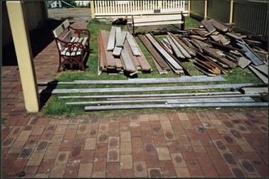 Floor timbers lying on the front lawn of OPOM