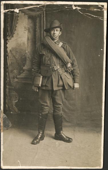 The photo is of Ern Harrap in uniform the inscription on the back reads ' To Dear George and Alice from your loving brother Ern ‘