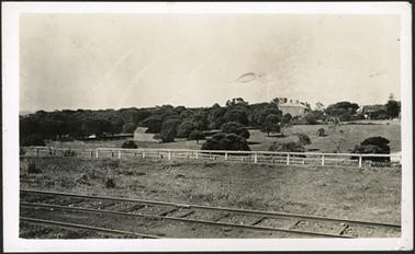 Image taken from Morningtion railway station, looking toward Sutton Grange, cowshed in foreground